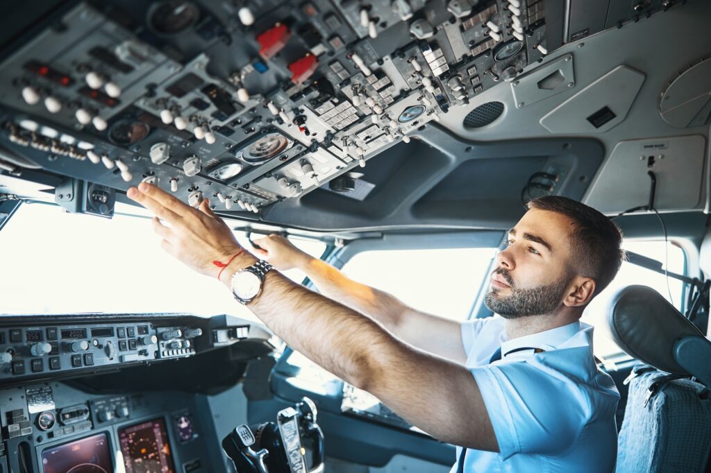 making-final-preparations-in-the-flight-deck-of-passenger-aircraft.jpg